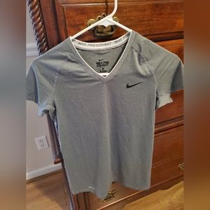 Nike pro combat gray vneck ss shirt. Gray small. Never worn